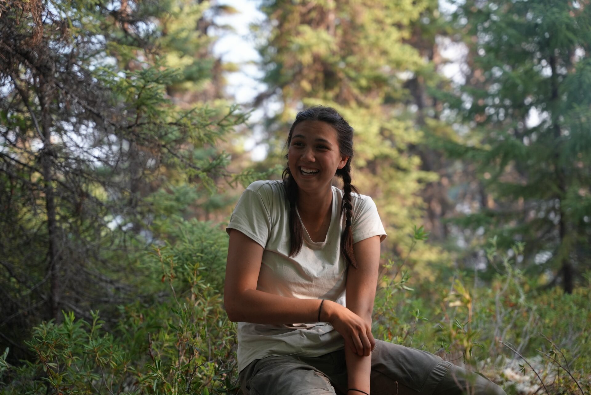 Woman smiling in a forest