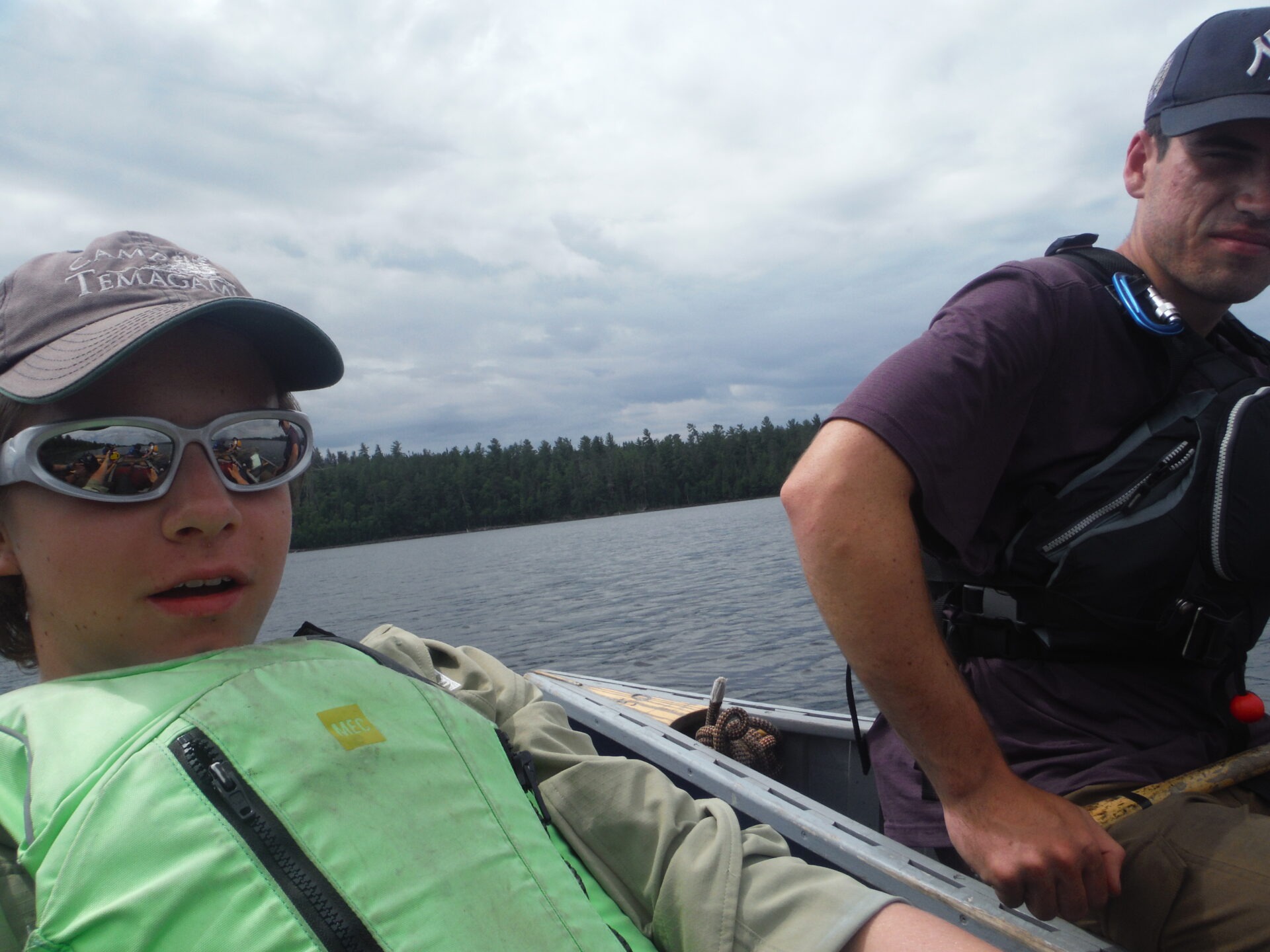 Men canoeing on a lake