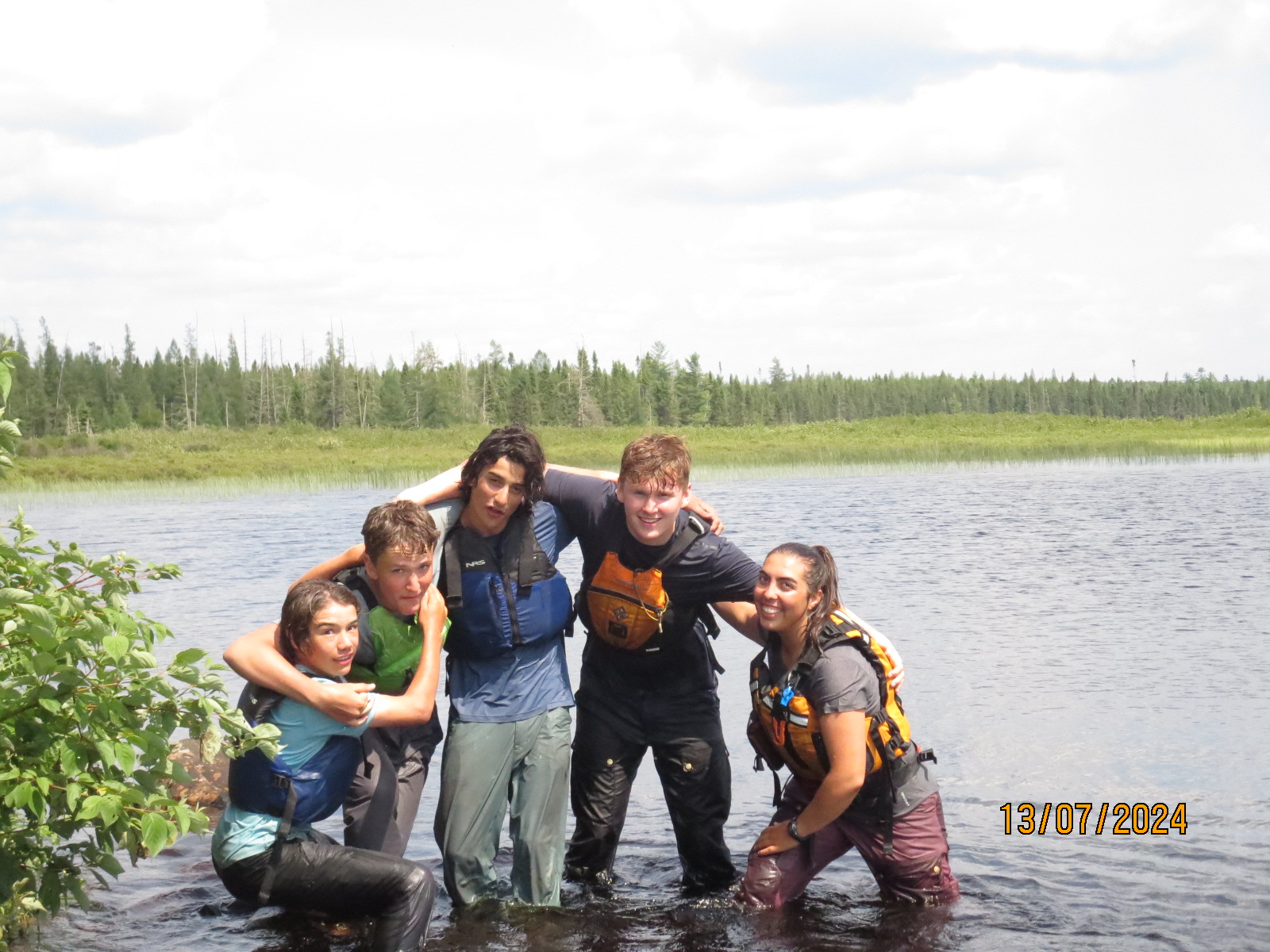 Group of friends in a lake