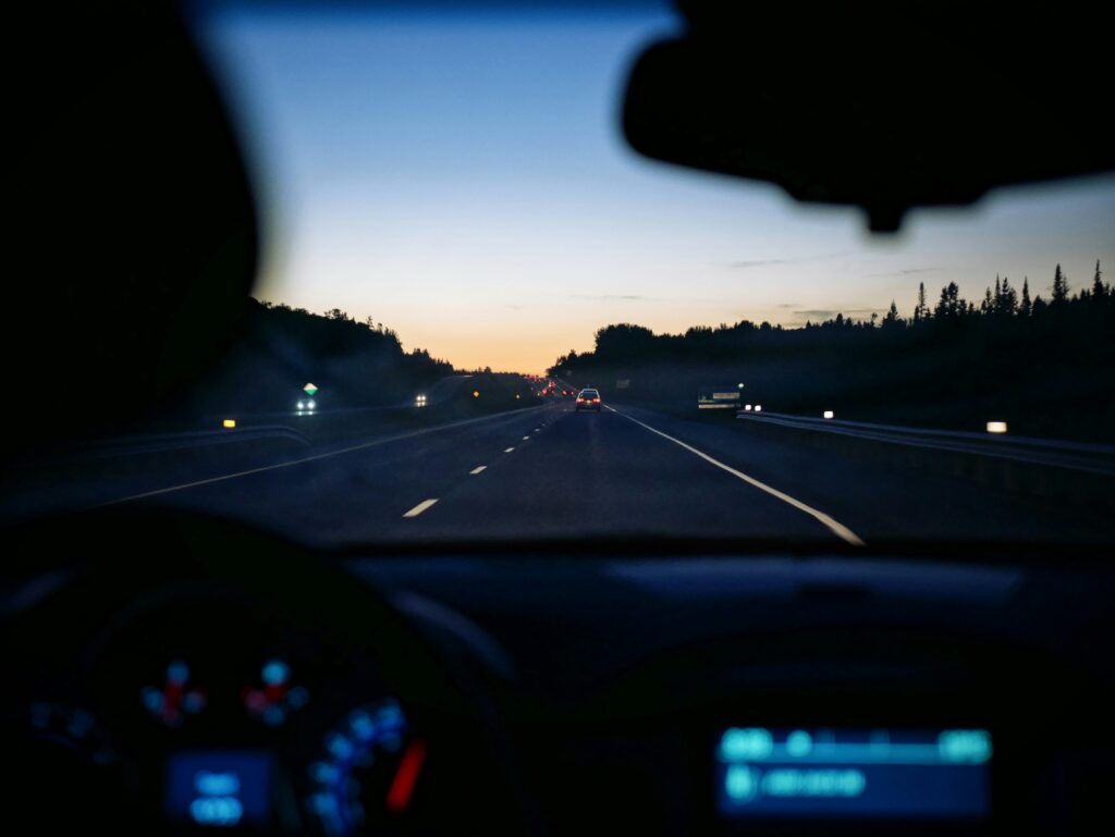 Driving on the highway at sunset